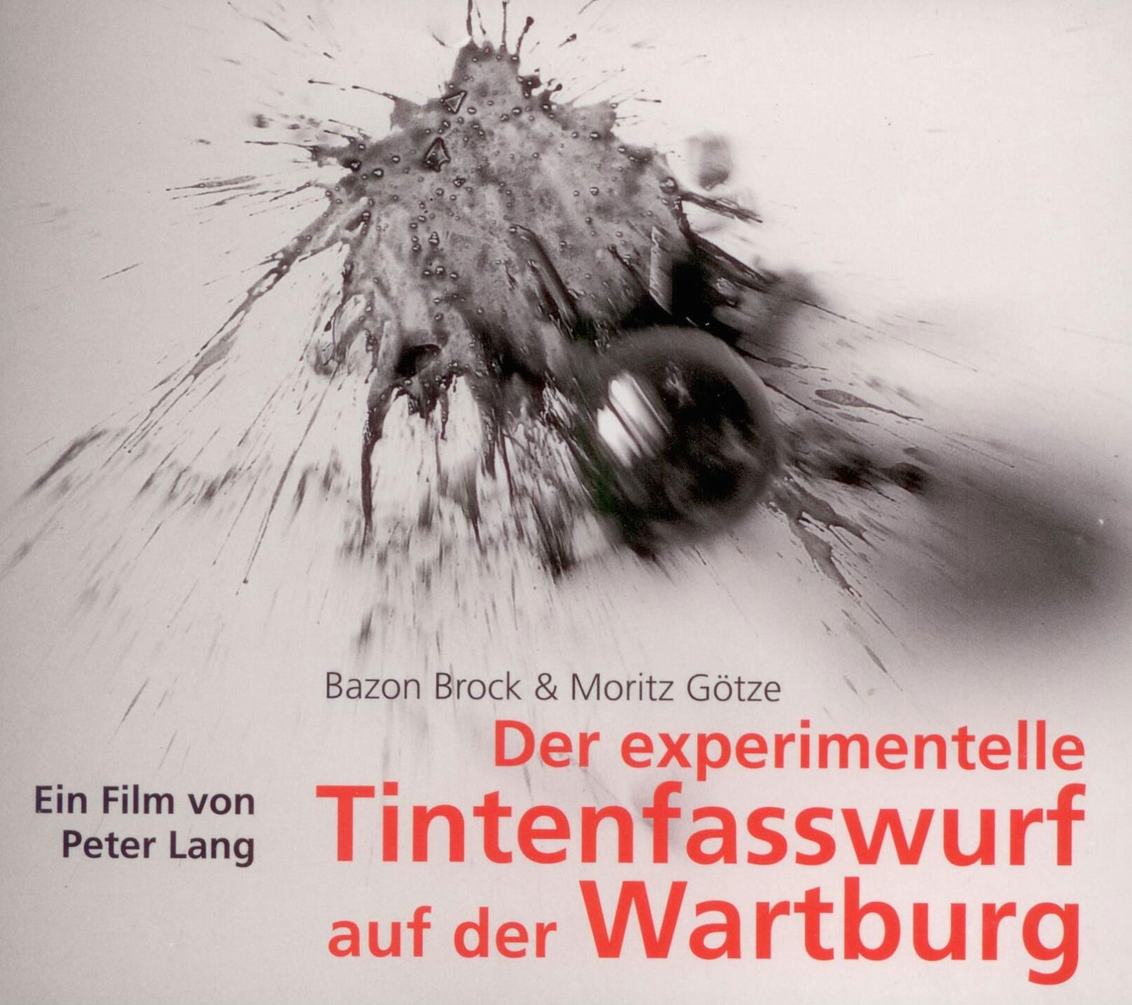 Bazon Brock & Moritz Götze: Der experimentelle Tintenfasswurf auf der Wartburg, Bild: Ein Film von Peter Lang, 10.11.2009. Halle/Saale: Hasenverlag, 2014.